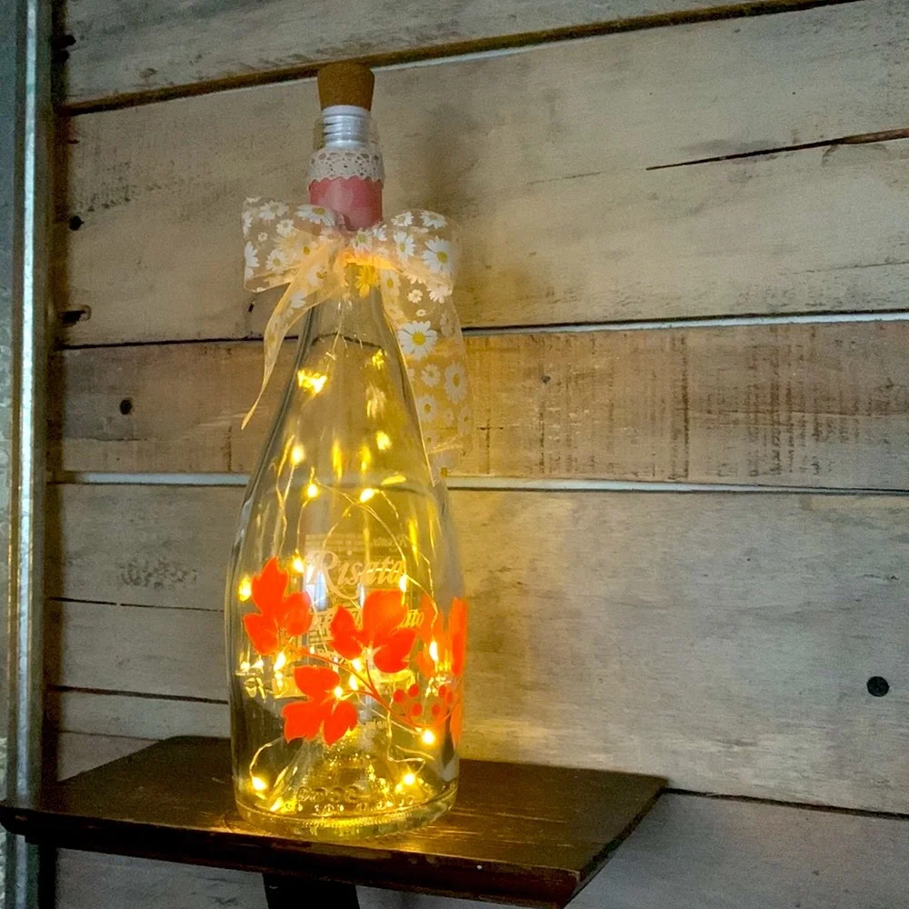 Hand Crafted wine Bottle Lantern with painted Orange Floral Design